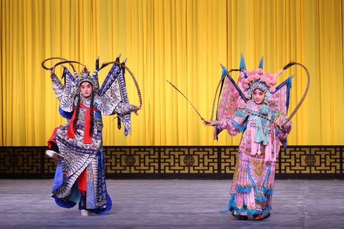 Peking opera performers in elaborate traditional costumes